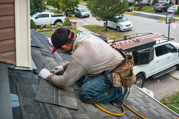 Professional Roofing technician working in Boston, MA